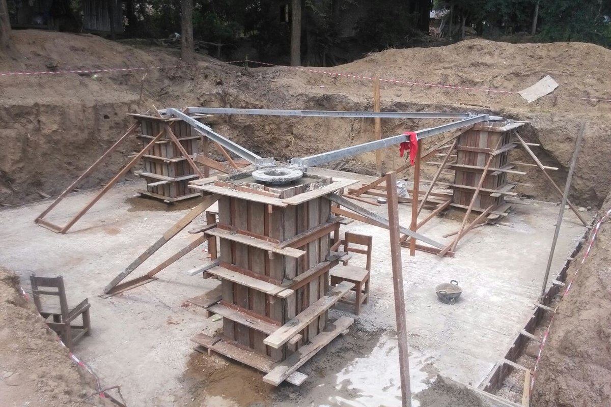 Foundation excavation and rebar reinforcement cage for telecom tower