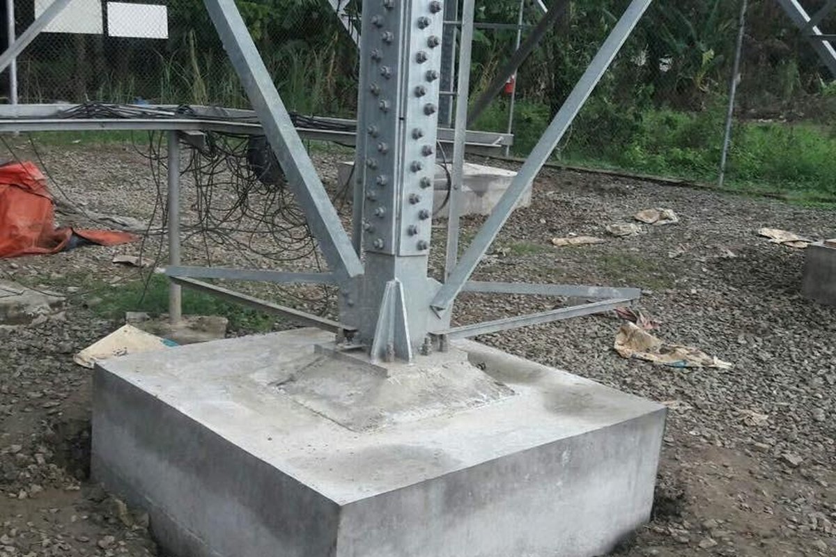 Concrete underpinning and enlargement of existing tower foundation